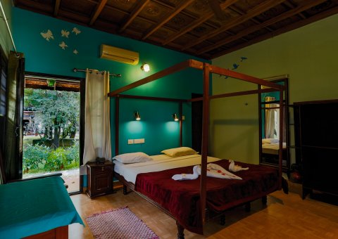 Direkt von Ihrem Zimmer gelangen Sie in den Garten des Athreya Ayurvedic Centre Hotel