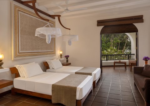 Großzügiges Schlafzimmer im Deluxe Room