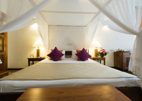Die meisten Studio Deluxe Zimmer haben ein Himmelbett